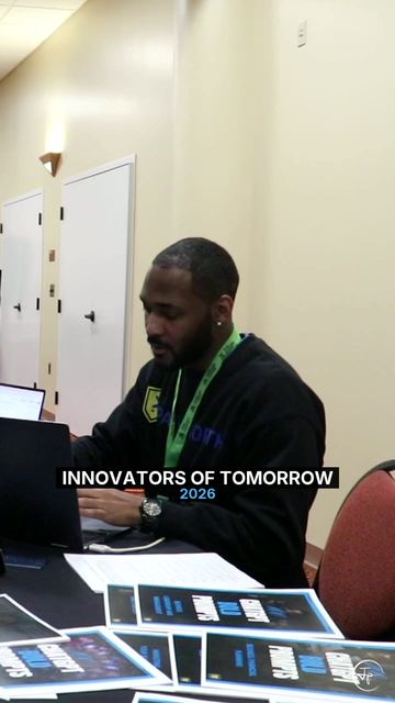 Jermaine at the laptop at Innovators of Tomorrow, 2026